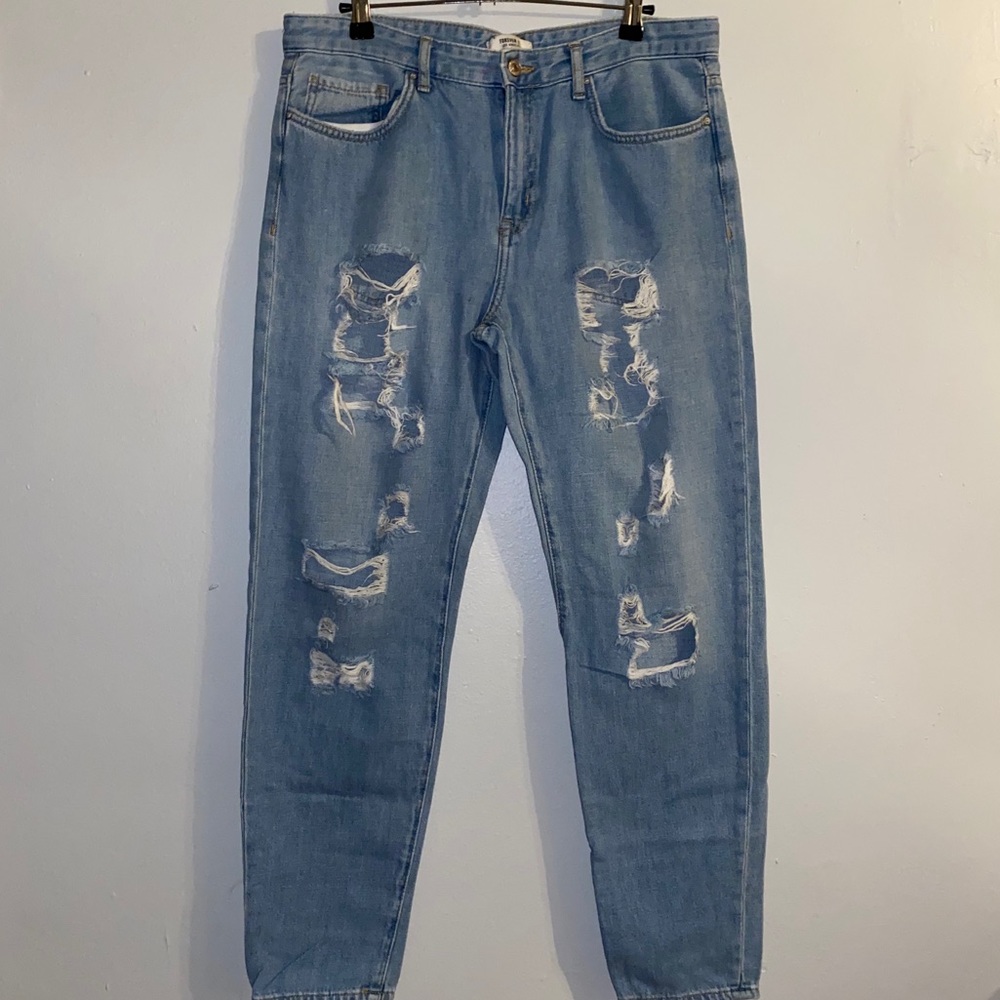 Distressed Light Blue Denim Jeans